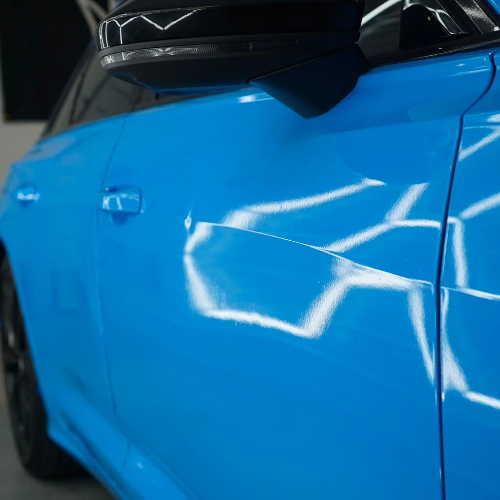 Same Audi A6 finished in a District 3 Performance blue wrap