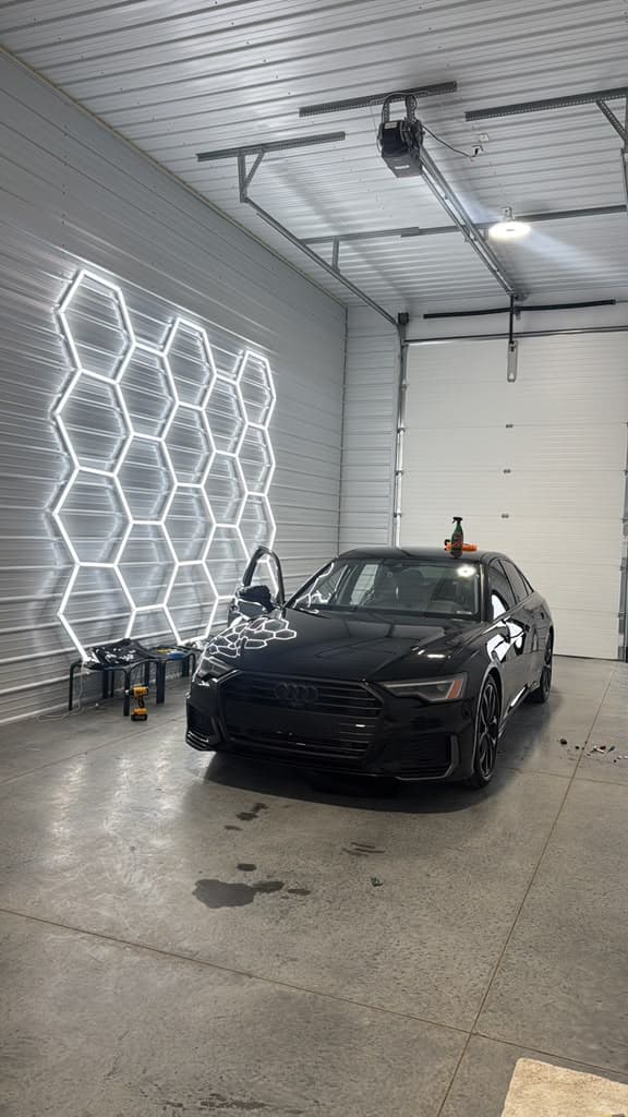 Audi A6 in factory black paint before the wrap